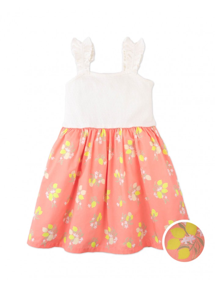 Josette Dress with a Ribbed Top, Ruffle Strap Sleeves, and Shirred Bottom.