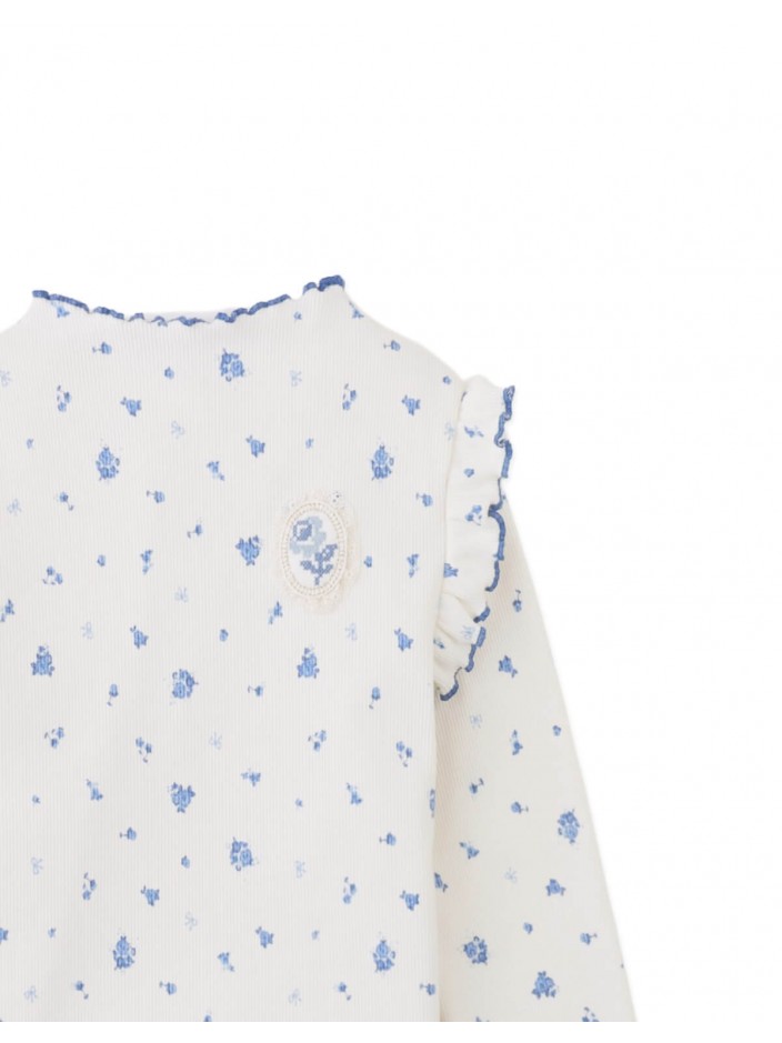 Drusilla Tee with Ruffled Shoulders and Cross-Stitched Flower Appliqué with Lace Trims