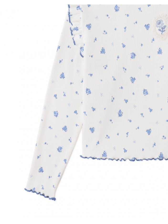 Drusilla Tee with Ruffled Shoulders and Cross-Stitched Flower Appliqué with Lace Trims